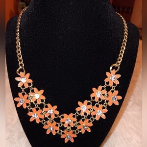 Chic Gold Color Necklace with Orange Floral Design